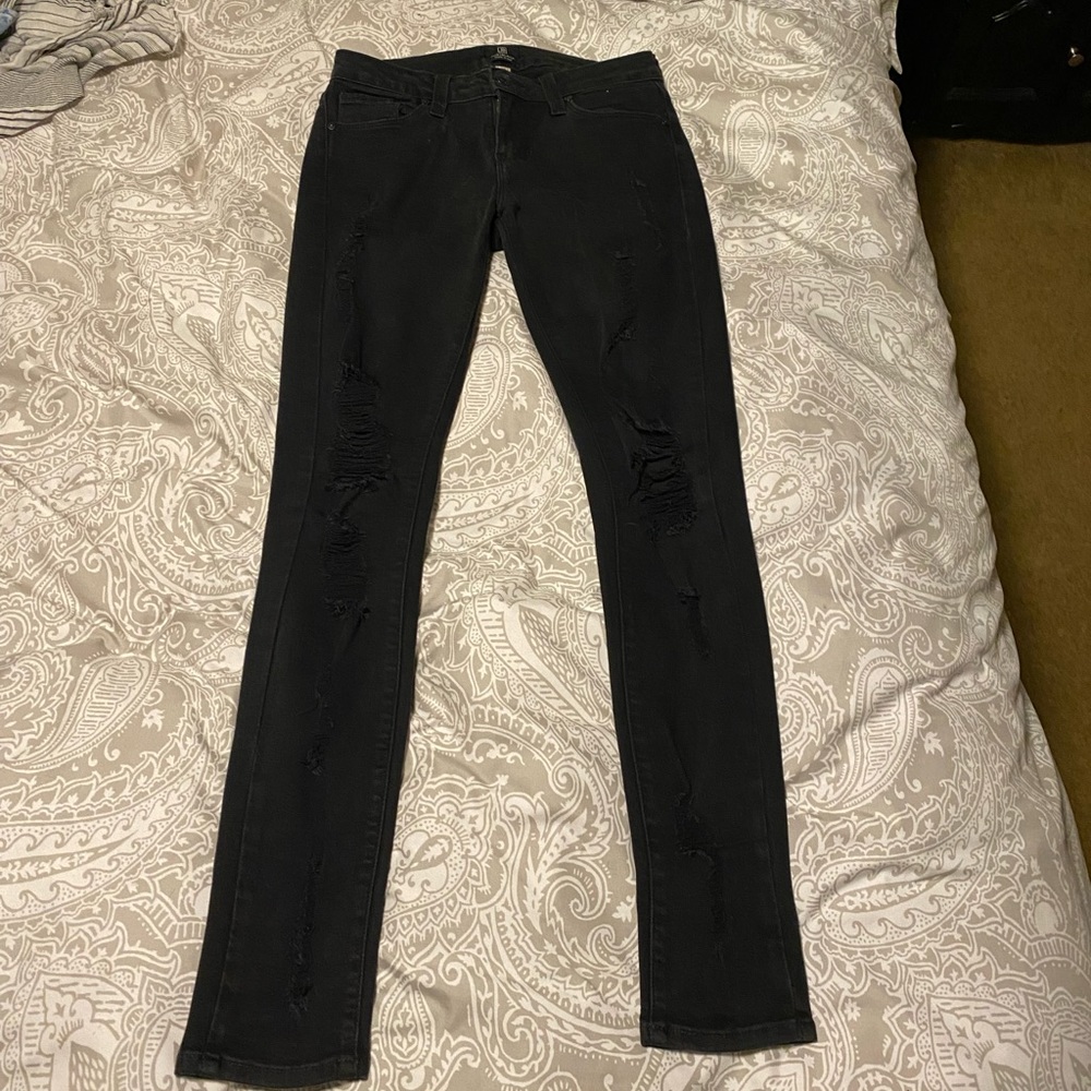 Just black ripped black jeans